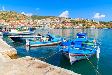 Obraz premium Traditional Greek fishing boats in Pythagorion port, Samos island, Greece