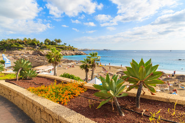 A view of sandy El Duque beach from promenade in Costa Adeje town, Tenerife, Canary Islands, Spain