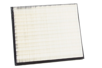 Flat air filter of the engine of the car on a white background