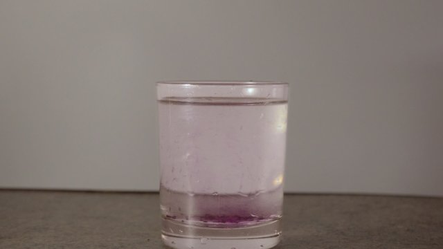 permanganic acid  in a glass