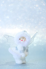 Christmas angel on a silver background