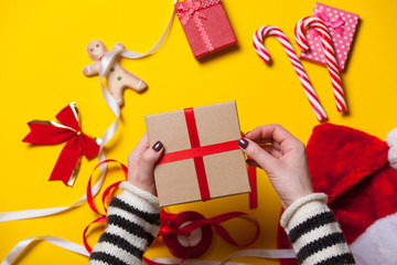 Female hands wrapping a gift