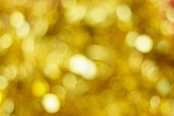 Obraz premium Abstract Christmas bokeh, bright blurred ribbon background