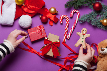 Female hands wrapping a gift