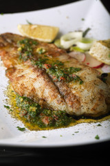 Grilled fish with lemon and rosemary