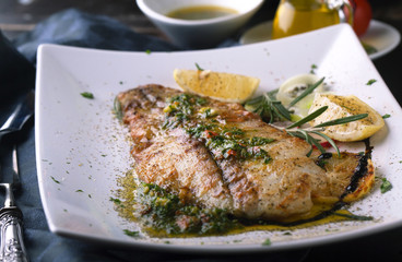 Grilled fish with lemon and rosemary