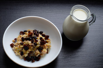 Breakfast with oatmeal and milk