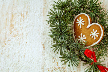 Christmas gingerbread cookies on white wooden background 