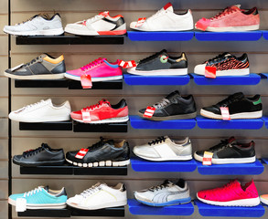 Big collection of different sport shoes.