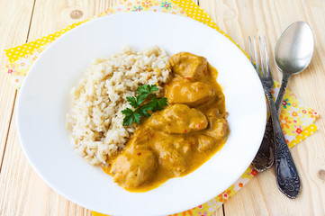 Chicken cooked in paprika and cream sauce, with ingredients
