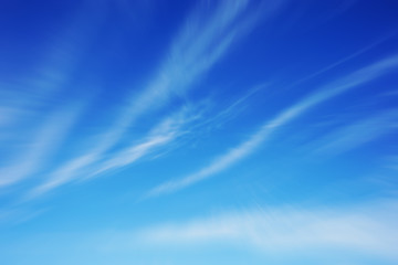 blue motion blurred sky with clouds