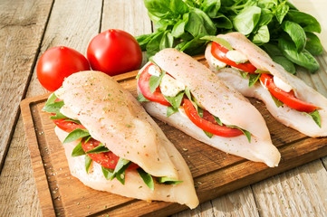 Raw chicken breasts stuffed with vegetables