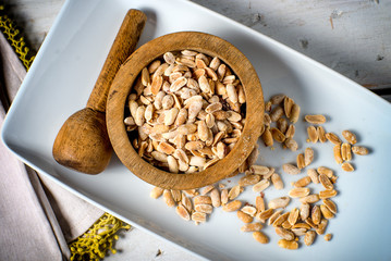 Bowl of fresh peanuts crushed ingredient