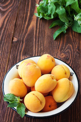 Bowl of harvested apricots