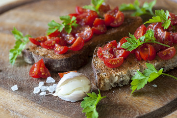 Italian bruschetta with cherry tomatoes on whole grain bread
