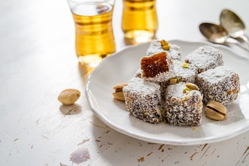 Traditional turkish sweet lukum served with tea