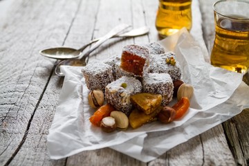 Traditional turkish sweet lukum served with tea