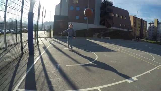 Fathers POV playing basketball with son
