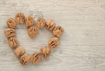 wallnuts on vintage wooden table