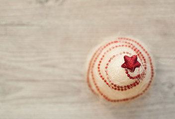 Fototapeta premium white christmas tree on vintage wooden table