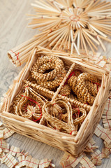 czech staw christmas decirations on vintage wooden table