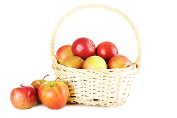 Fresh apples in basket isolated on a white