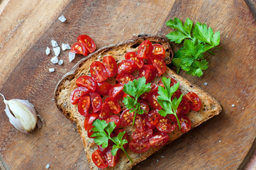 Italian bruschetta with cherry tomatoes on whole grain bread