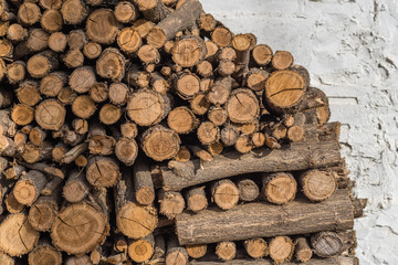 Ready for winter. Firewood stacked against the wall. Outdated energy source.