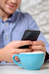 Happy friends sitting in the cafe 