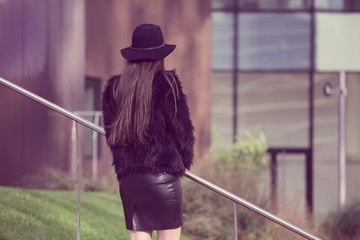 young beautiful woman standing alone