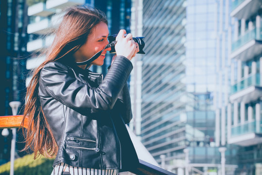 Young Beautiful Woman Taking Photo In The City