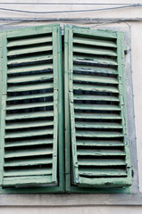 old shutters closed and dilapidated