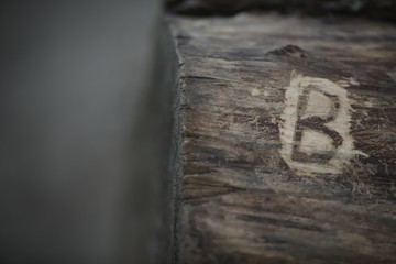 letter B cut into wood