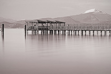 Wooden jetty with penthouse on lake