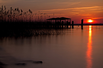 Beautiful sunset on lake in Italy