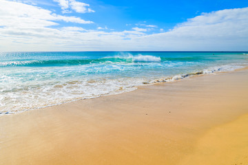 Fototapeta na wymiar Ocean wave water on beautiful Jandia beach, Morro Jable, Fuerteventura, Canary Islands, Spain