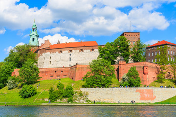 Fototapeta na wymiar View of Wawel Royal Castle built along Vistula river on sunny beautiful day, Poland