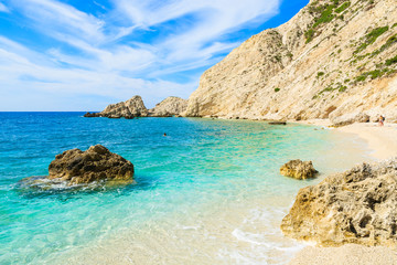 Fototapeta na wymiar View of beautiful beach with rock cliffs on Kefalonia island, Greece