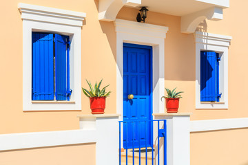 Facade of typical Greek house built in Venetian style in Assos town, Kefalonia island, Greece