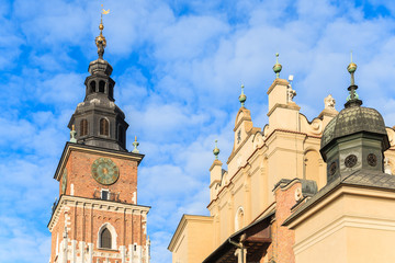 City Hall tower against blue sky on main market square of Krakow, Poland