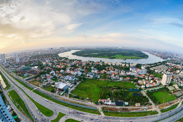 Panoramic view of Thanh Da peninsula, Ho Chi Minh city (or Saigon) in sunset by fisheye lens, Vietnam