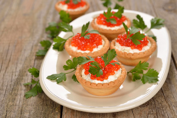 Appetizer with red caviar