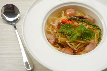 Spicy spaghetti stir fry with sausage