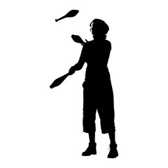 Silhouette of street juggler