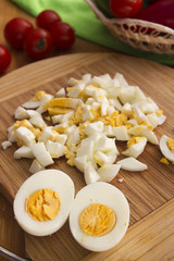 Kitchen board with finely chopped eggs