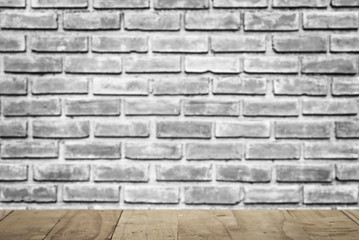 Wooden with brick wall background.