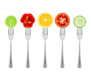 Healthy diet, organic food on forks with vegetables and fruit.