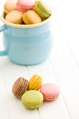 sweet french macarons on kitchen table