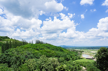 Beautiful summer landscape with blue sky and green mountains