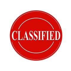 Classified white stamp text on circle on red background